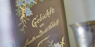 Ornate volume of poetry by Annette von Droste-Hülshoff in the Meersburg Prince's Little House